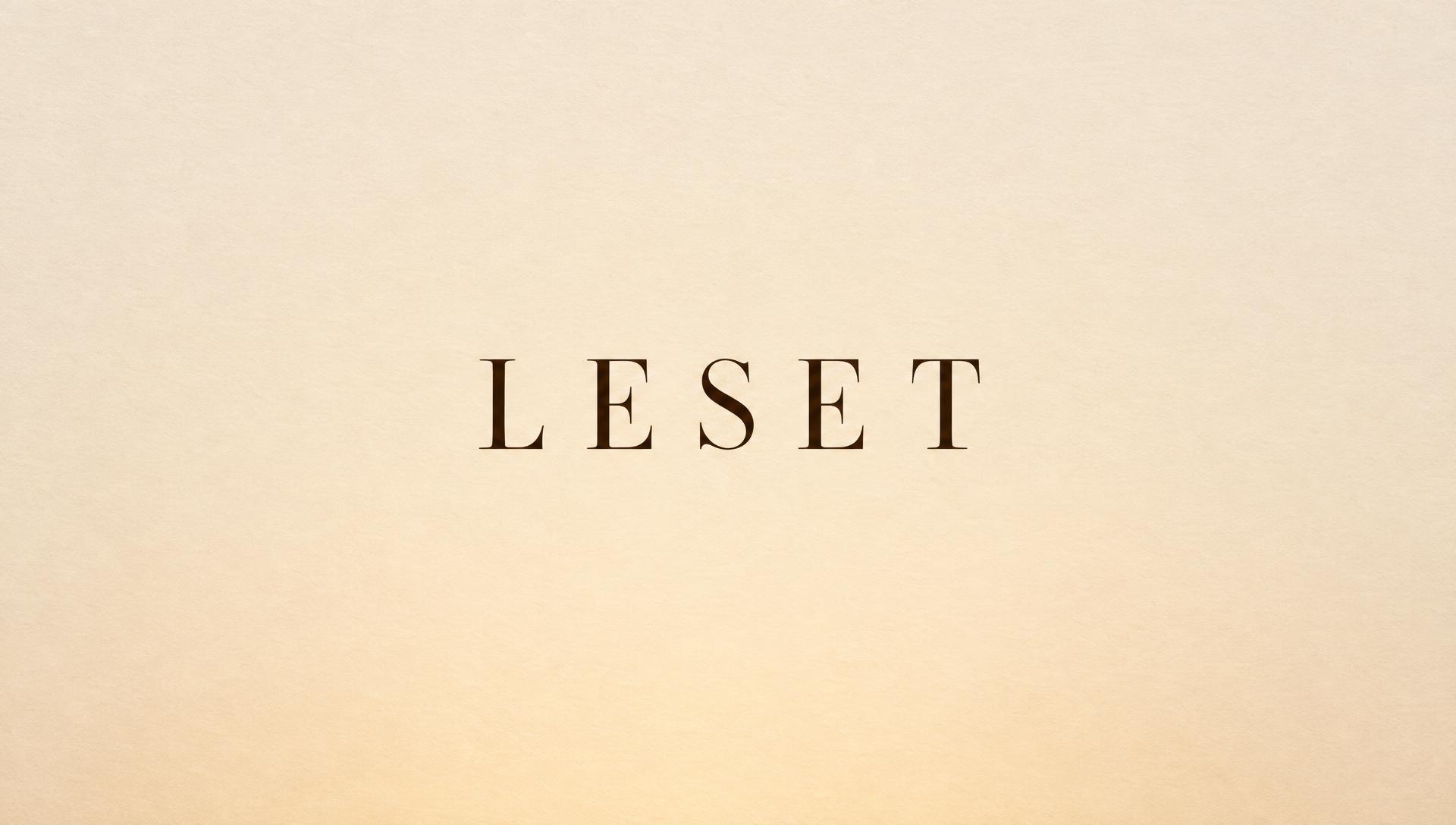 The LESET name on a warm cream field