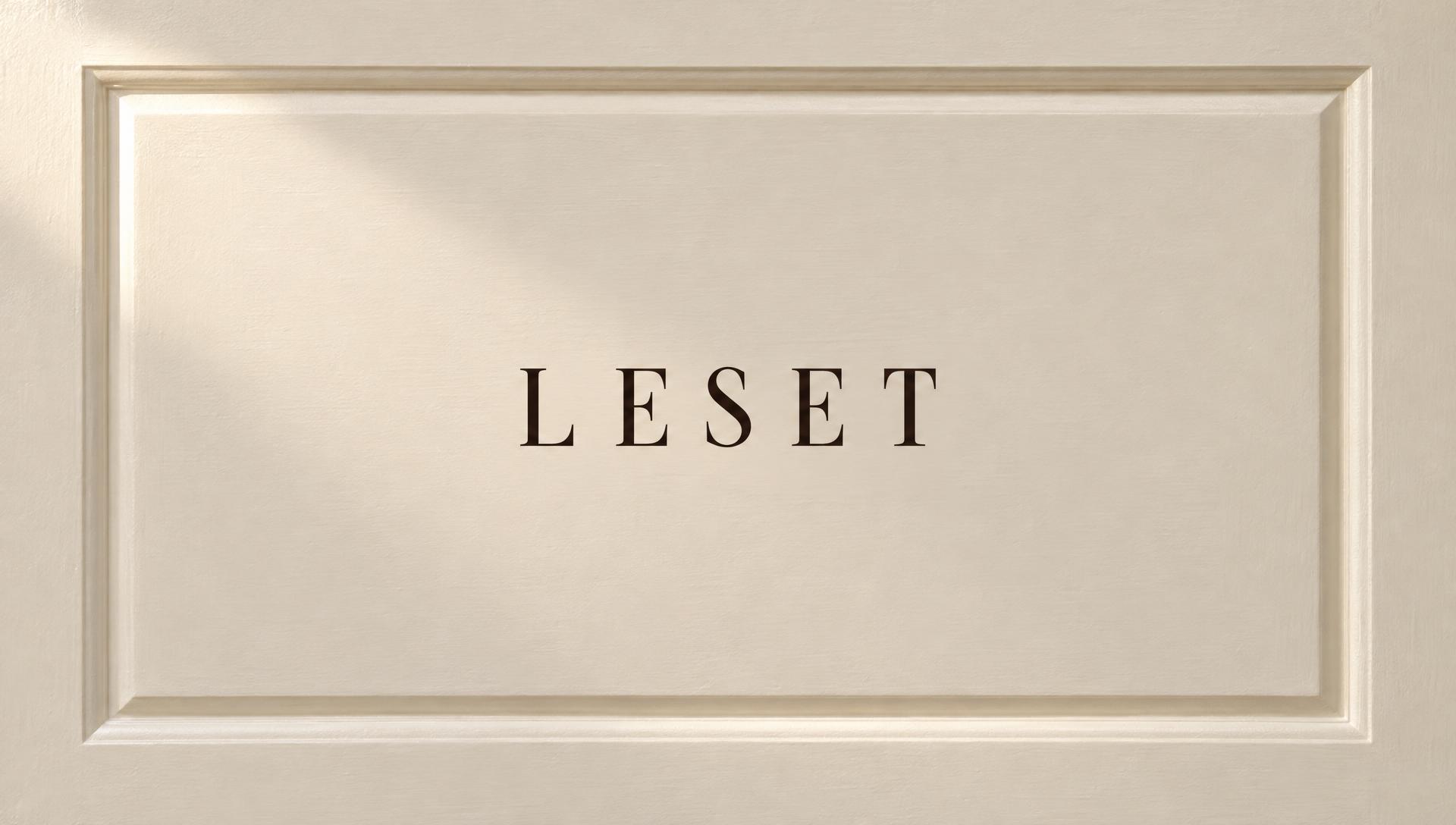 The LESET name on a painted door panel
